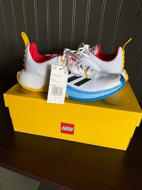 adidas Kids White Sneakers with Red, Blue & Yellow Accents